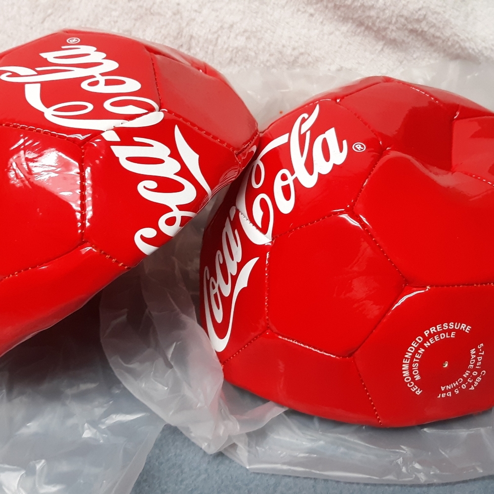 Coca-Cola logo soccer balls